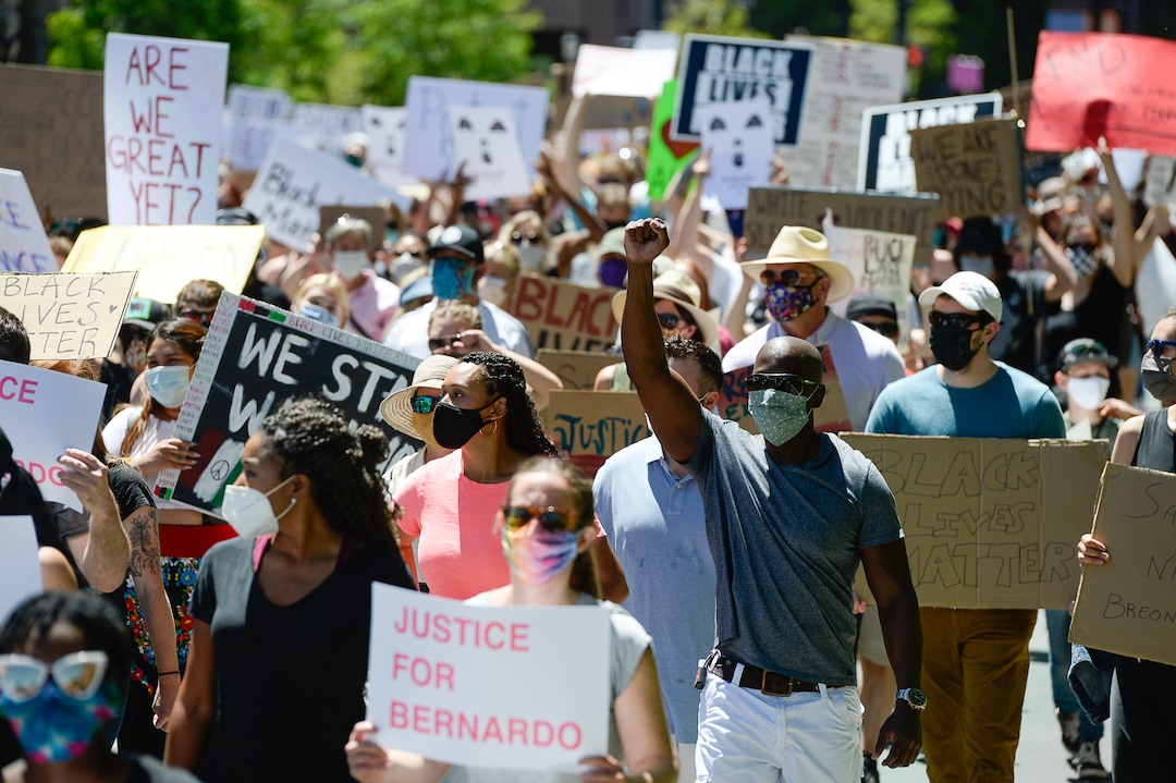 (Francisco Kjolseth  |  The Salt Lake Tribune) Demonstrators march the streets of downtown Salt Lake City for a rally as part of a series of Juneteenth celebrations on Friday, June 19, 2020.