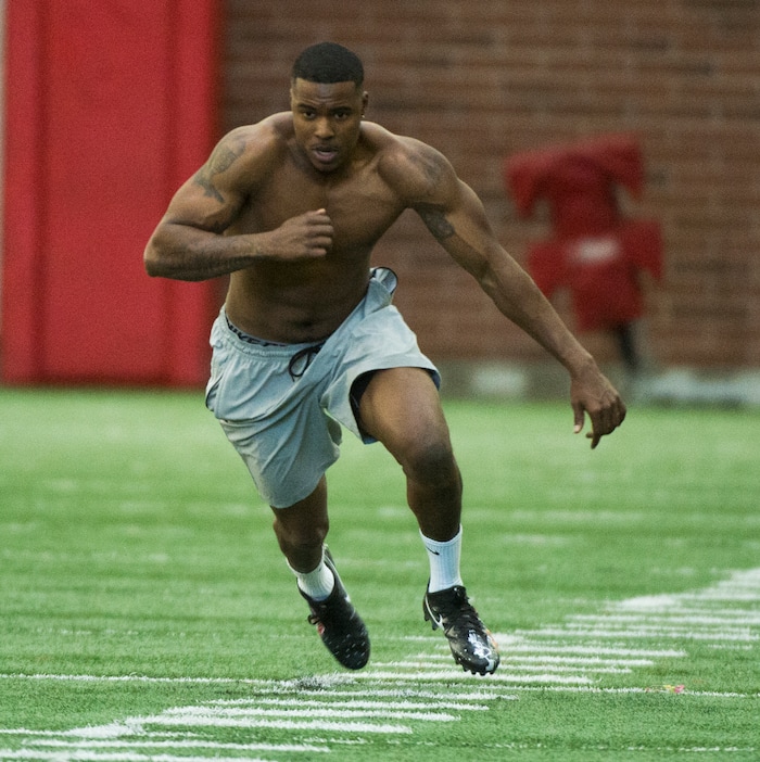 (Rick Egan  |  The Salt Lake Tribune)      Troy Williams runs an agility drill, during University of Utah's 2018 Pro Day for NFL scouts, at Spence Eccles Field House, Wednesday, March 28, 2018.