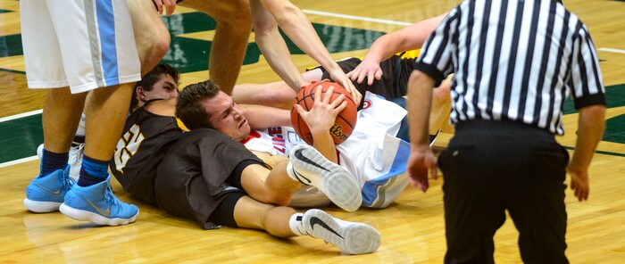 (Steve Griffin  |  The Salt Lake Tribune) Granger's Brendan Blank fights for the ball during 6A basketball playoff game against Davis at Utah Valley UniversityÕs UCCU Center in Provo Tuesday Feb. 27, 2018.