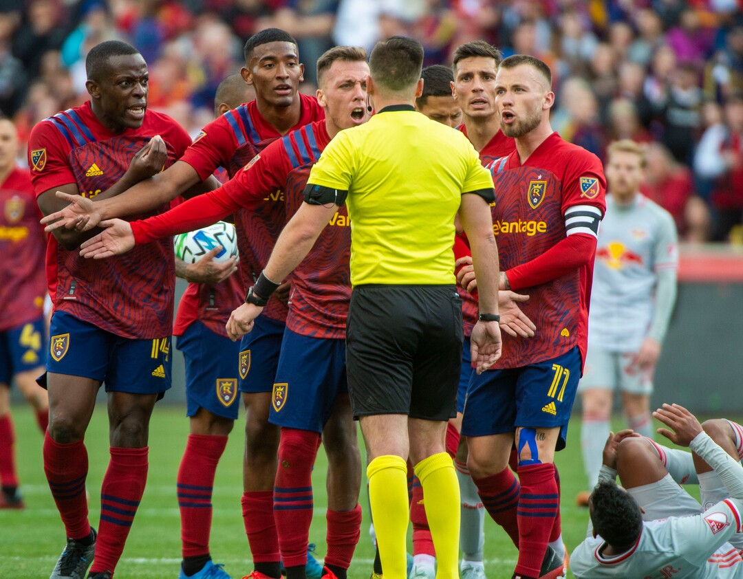 (Rick Egan  |  The Salt Lake Tribune)   Real Salt Lake plead with the official, as New York Red Bulls midfielder Cristian Casseres Jr (23) takes his time getting up, in MLS acton between Real Salt Lake and the New York Red Bulls at Rio Tinto Stadium, Saturday, March 7, 2020.