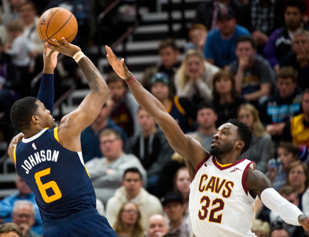 (Rick Egan  |  The Salt Lake Tribune)   Utah Jazz guard Joe Johnson (6) shoots overCleveland Cavaliers forward Jeff Green (32), in NBA action Utah Jazz vs Cleveland Cavaliers, in Salt Lake City,  Saturday, December 30, 2017.