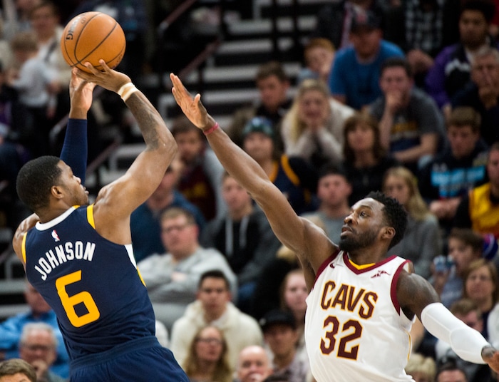 (Rick Egan  |  The Salt Lake Tribune)   Utah Jazz guard Joe Johnson (6) shoots overCleveland Cavaliers forward Jeff Green (32), in NBA action Utah Jazz vs Cleveland Cavaliers, in Salt Lake City,  Saturday, December 30, 2017.


