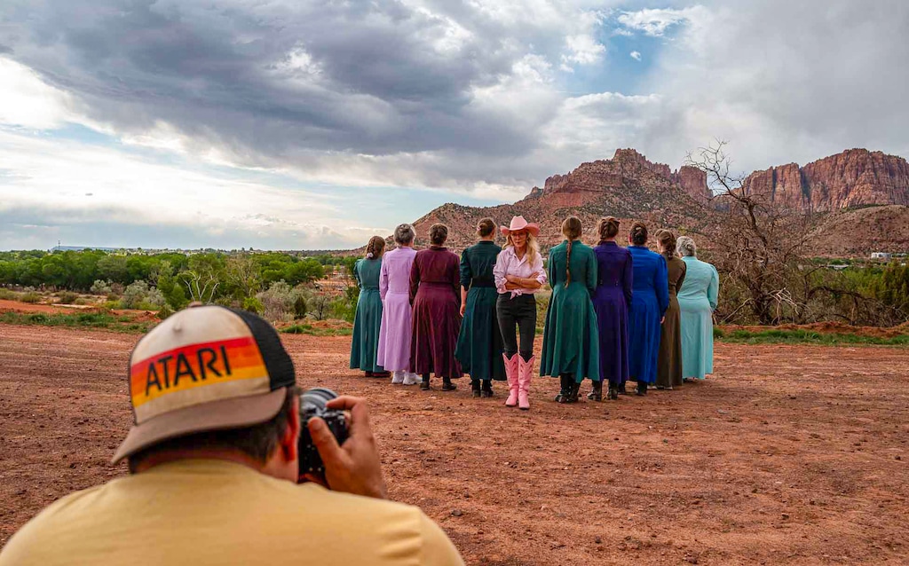 (Trent Nelson  |  The Salt Lake Tribune) Tolga Katas photographs Christine Marie with several fundamentalist women in Colorado City, Ariz. on May 3, 2025. A photograph from the session is the poster image for the upcoming documentary "Trust Me."