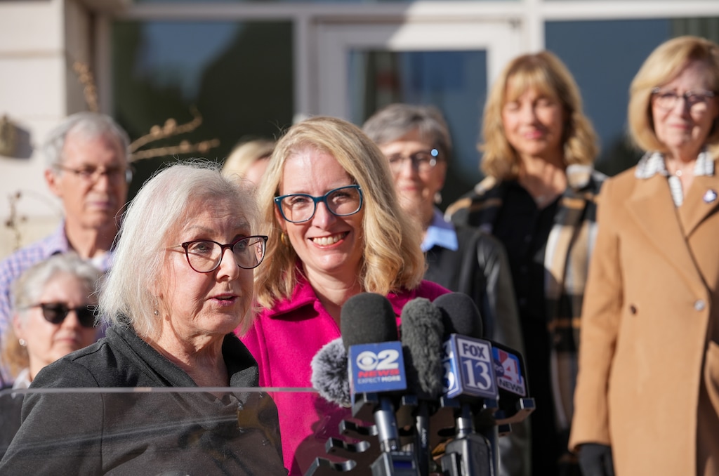(Chris Samuels | The Salt Lake Tribune) Katharine Biele, left, president of the Utah Chapter of the League of Women Voters, speaks as plaintiffs from a redistricting lawsuit hold a news conference outside Third District Court in Salt Lake City, Tuesday, Nov. 11, 2025. A judge selected a map proposed by the plaintiffs to be the 2026 congressional boundaries.