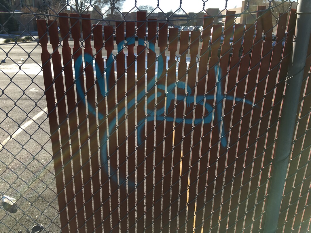 A graffiti tribute to Joey Kirk, who was known by his tag MOST, appears in a parking lot near 400 South and Denver St. in Salt Lake City. Kirk was killed by a TRAX train in November 2017.