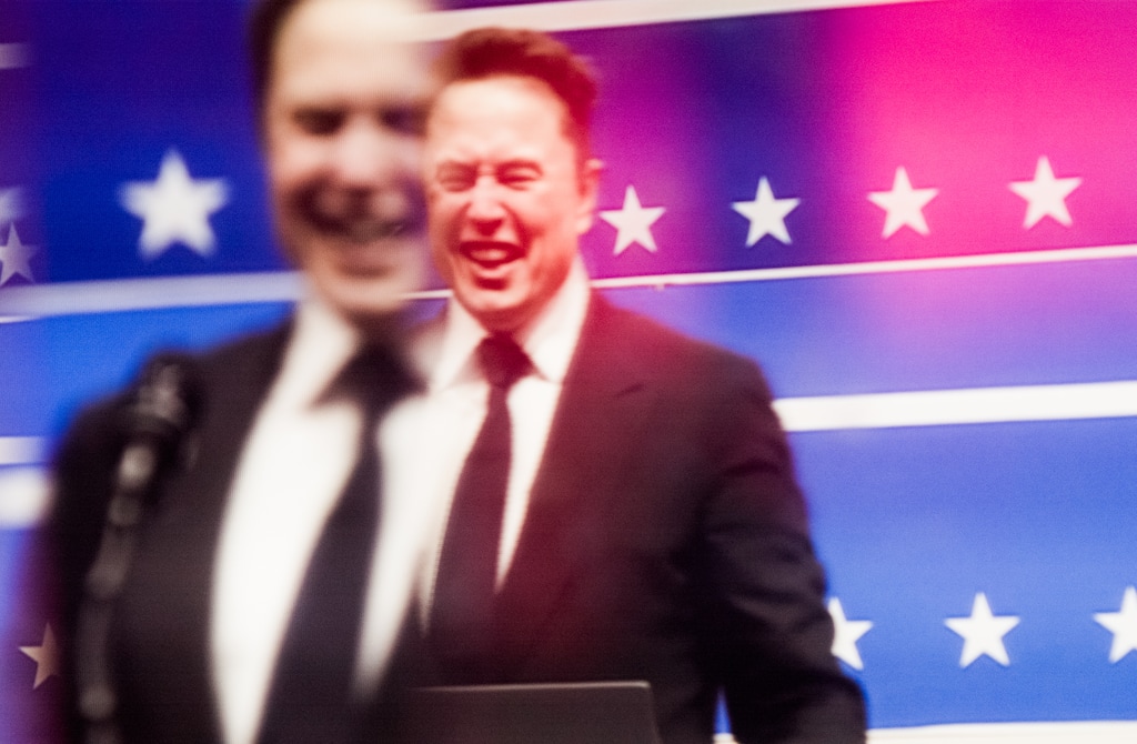 On the night of President Donald Trump's inauguration, Jan. 20, 2025, a television plays video of Elon Musk speaking. (IOULEX/The New York Times)
