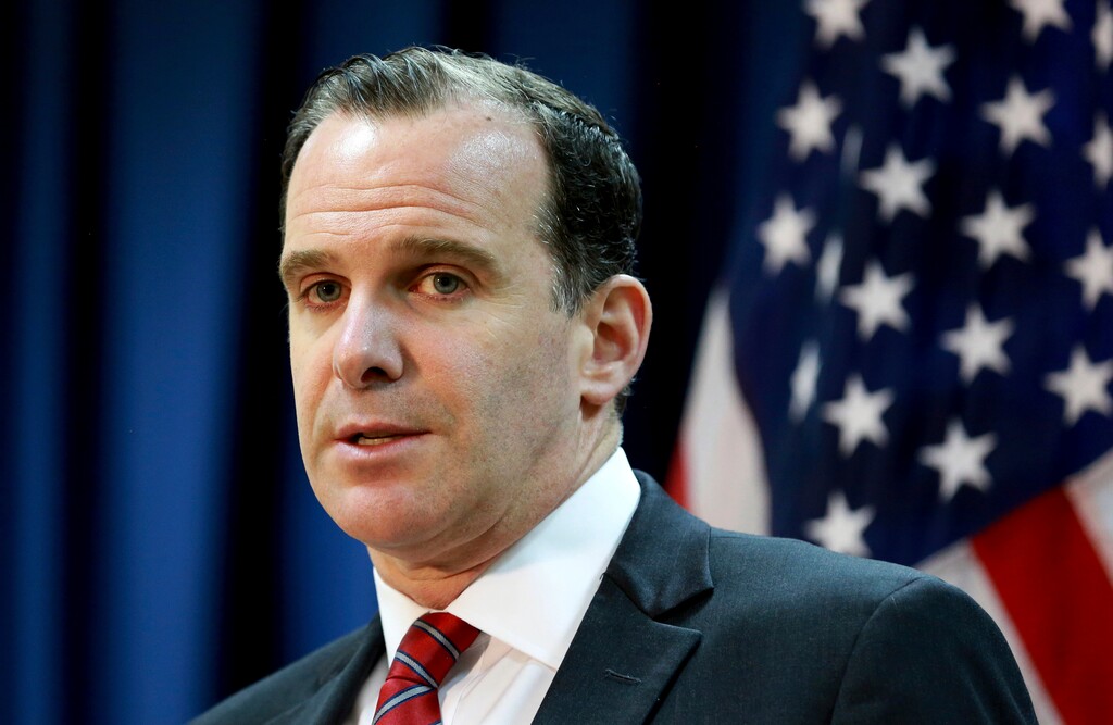 FILE - In this June 7, 2017 file photo, Brett McGurk, the U.S. envoy for the global coalition against IS, speaks during a news conference at the U.S. Embassy Baghdad, Iraq.  McGurk has resigned in protest to President Donald Trump’s abrupt decision to withdraw U.S. troops from Syria, joining Defense Secretary Jim Mattis in an administration exodus of experienced national security officials.  AP Photo/Hadi Mizban)