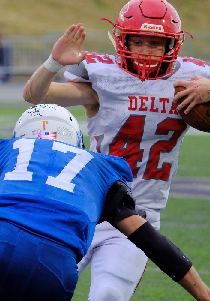 (Leah Hogsten  |  The Salt Lake Tribune) Delta's Dallin Draper is brought down by Beaver's Porter Hollingshead. Beaver High School boys' football team defeated Delta High School 35-16 during their class 2A state semifinal football game Saturday, November 4, 2017 at Weber State University's Stewart Stadium.