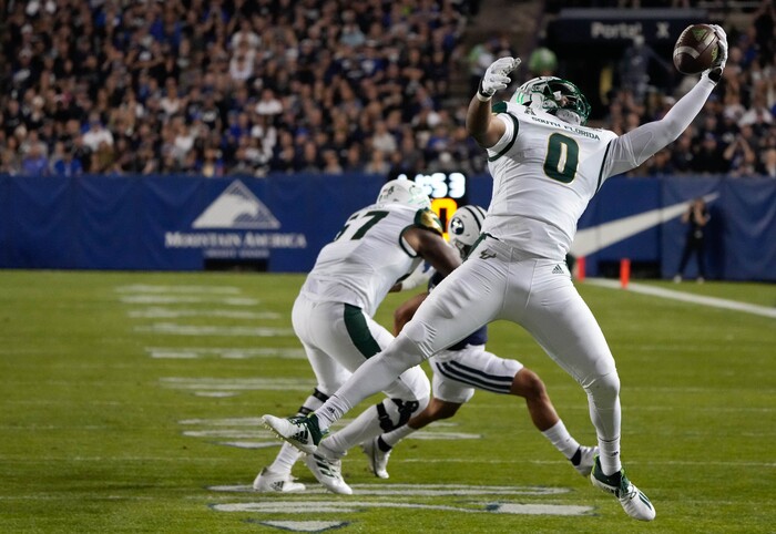 (Francisco Kjolseth | The Salt Lake Tribune) South Florida Bulls running back Jaren Mangham (0) stretches out for a pass in game action between the Brigham Young Cougars and the South Florida Bulls at LaVell Edwards Stadium in Provo, Saturday, Sept. 25, 2021.