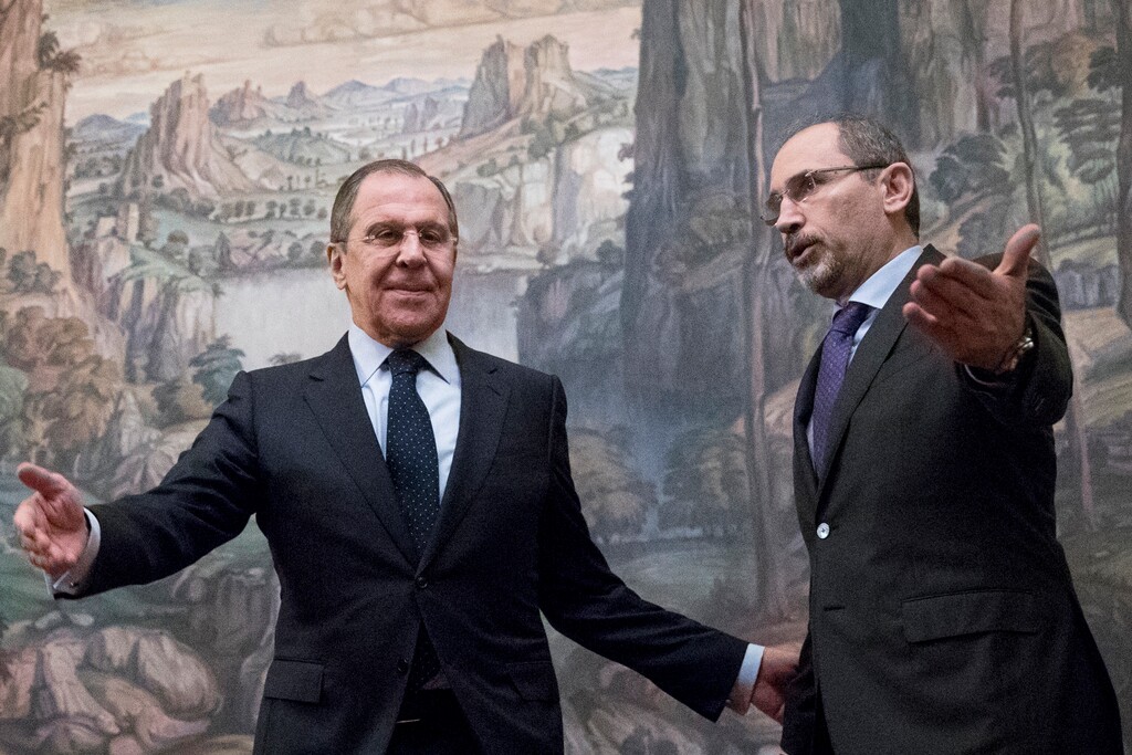 FILE - In this Jan. 24, 2017 file photo, Russian Foreign Minister Sergey Lavrov, left, welcomes Jordanian Foreign Minister Ayman Al Safadi during their meeting in Moscow, Russia. Lavrov said Monday, Sept. 11, 2017 that Saudi Arabia assured him it backs a Moscow-led process of negotiating gradual local cease-fires in Syria, including the establishment of "de-escalation zones." Lavrov spoke after a meeting Monday with his Jordanian counterpart and a day after talks with Saudi leaders. (AP Photo/Pavel Golovkin, File)