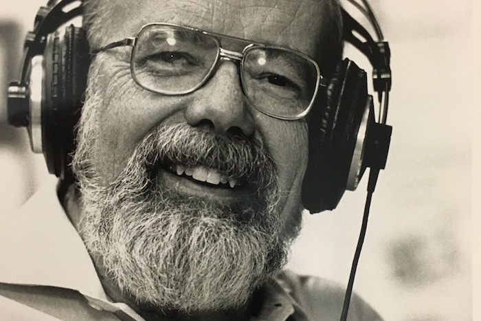 (Tribune file photo) KUER's Gene Pack in 1991. In 40 years on the air for KUER, Pack introduced generations of listeners to classical music. Pack died March 3, 2019, at age 86.