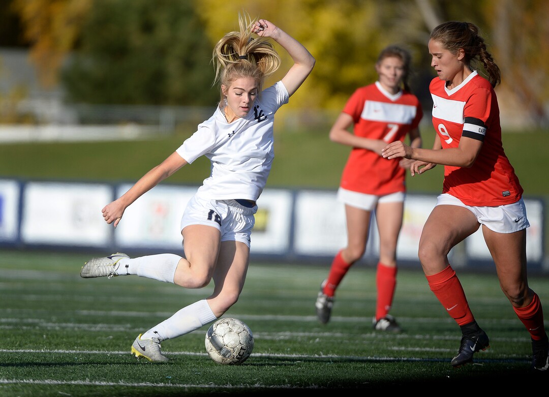 (Scott Sommerdorf   |  The Salt Lake Tribune)   Corner Canyon's Hallee Jones passes during first half play. East beat Corner Canyon 4-1 in a Class 5A girls' soccer state quarterfinal, Thursday, October 12, 2017. 