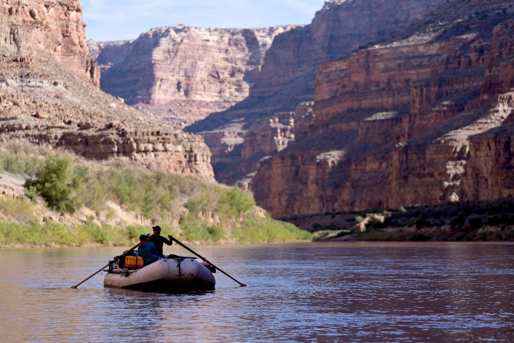 (Francisco Kjolseth | The Salt Lake Tribune) Boaters with the Returning Rapids Project float down the Colorado River as they study the effects of an ever-receding Lake Powell in Cataract Canyon in October 2021.
