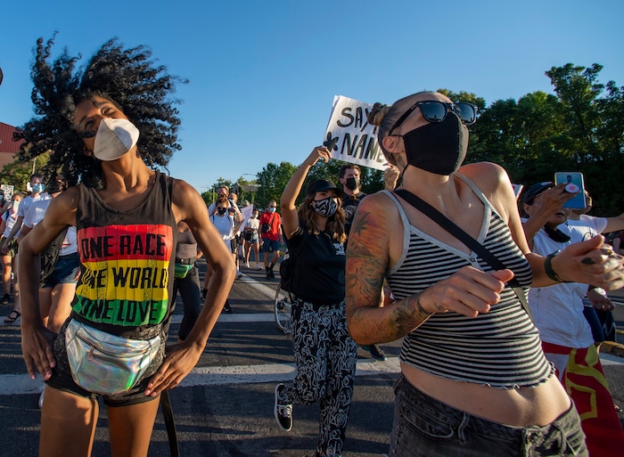 (Rick Egan  |  The Salt Lake Tribune)     Kayla McKay and Kayla Janae Dixon dance in the streets of Salt Lake City, during the Dance Dance Revolution protest for racial equality, on Sunday, Aug. 9, 2020.