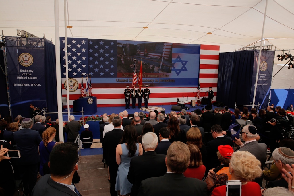 . (AP Photo/Sebastian Scheiner) Presentation of colors by U.S Marines and singing of the U.S. national anthem during the opening ceremony of the new U.S. embassy in Jerusalem, Monday, May 14, 2018. Amid deadly clashes along the Israeli-Palestinian border, President Donald Trump’s top aides and supporters on Monday celebrated the opening of the new U.S. Embassy in Jerusalem as a campaign promised fulfilled.