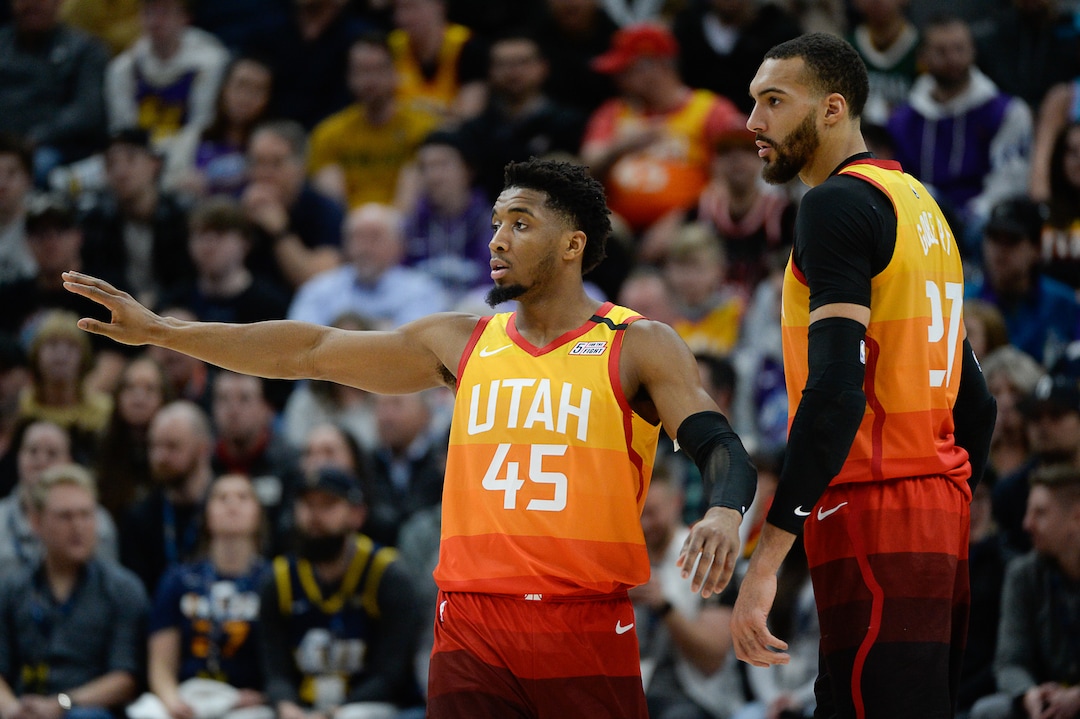 (Francisco Kjolseth  |  The Salt Lake Tribune) Utah Jazz guard Donovan Mitchell (45) and Utah Jazz center Rudy Gobert (27) speak as the Utah Jazz host the Miami Heat in their NBA basketball game at Vivint Smart Home Arena in Salt Lake City on Wednesday, Feb. 12, 2020.