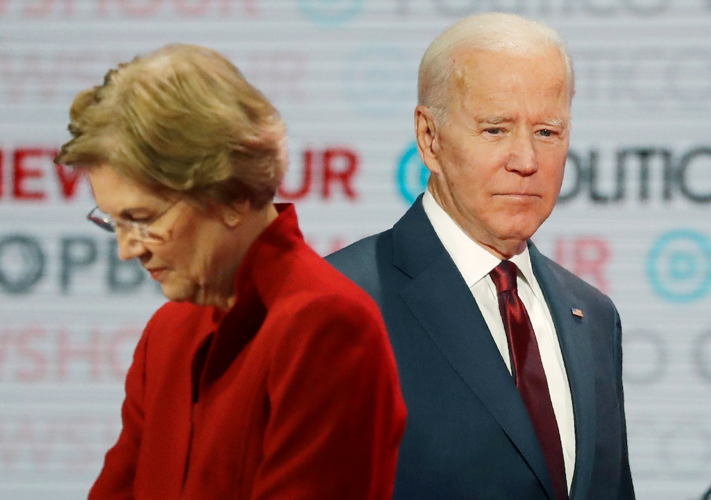 (Chris Carlson | AP file photo) In this Dec. 19, 2019, photo, Democratic presidential candidates Sen. Elizabeth Warren, D-Mass., left, and former Vice President Joe Biden stand on stage during a break at a Democratic presidential primary debate in Los Angeles.