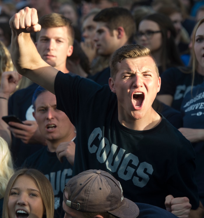 (Rick Egan  |  The Salt Lake Tribune)     Jarod Ivins of Murray Utah, cheers for the Cougars, in football action between Brigham Young Cougars and McNeese State Cowboys, at Lavell Edwards Stadium, Saturday, Sept. 22, 2018.


