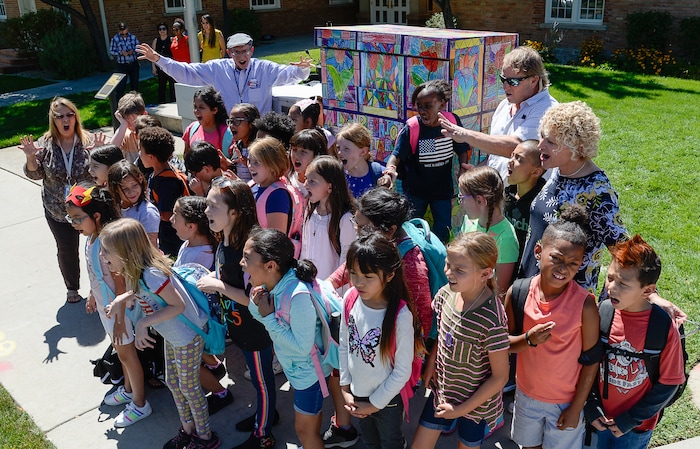 (Francisco Kjolseth  |  The Salt Lake Tribune)  Bennion Elementary school make the roar of the bobcat, their school mascot as they join Mayor Jackie Biskupski for the unveiling of the students artwork as part of the ColorSLC program, on Tuesday, Aug. 20, 2019, in which artwork from each of the district's elementary schools decorated utility boxes near each school.