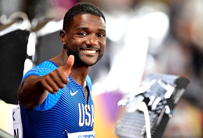 United States' Justin Gatlin gestures after his heat in the Men's 100 meters during the World Athletics Championships in London Friday, Aug. 4, 2017. (AP Photo/Martin Meissner)