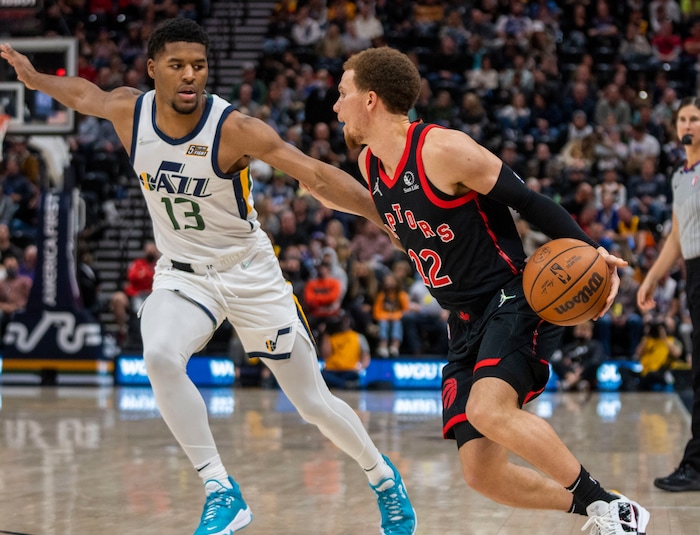 (Rick Egan | The Salt Lake Tribune). Utah Jazz guard Jared Butler (13) guards Toronto Raptors guard Malachi Flynn (22), in NBA action between Utah Jazz and Toronto Raptors, at Vivint Arena, in Salt Lake City, on  Thursday, Nov. 18, 2021.