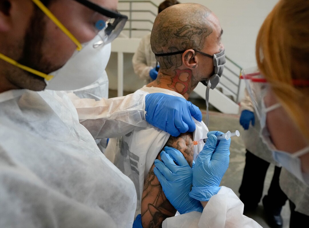 (Francisco Kjolseth | The Salt Lake Tribune) Sean Gonzales receives the COVID-19 vaccine from Nomi Health staff at the Utah State Prison in Draper, on Tuesday, July 27, 2021.