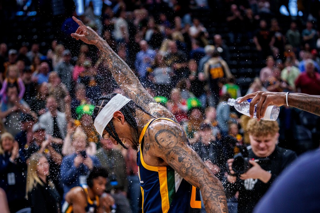 (Trent Nelson | The Salt Lake Tribune) Utah Jazz guard Jordan Clarkson (00) is splashed with water by teammates as the Utah Jazz host the Sacramento Kings, NBA basketball in Salt Lake City on Saturday, March 12, 2022. Clarkson finished with a career-high 45 points.