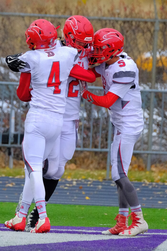 (Leah Hogsten  |  The Salt Lake Tribune) Delta's Trevor Burton pulls in the touchdown pass. Beaver High School boys' football team defeated Delta High School 35-16 during their class 2A state semifinal football game Saturday, November 4, 2017 at Weber State University's Stewart Stadium.