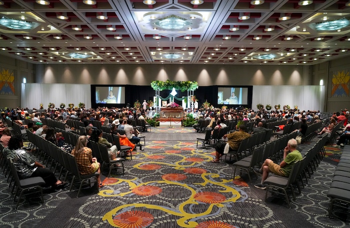 (Bethany Baker  |  The Salt Lake Tribune) People gather during the celebration of life for Afa Ah Loo, the man shot and killed during the 'No Kings' protest, during the community event at the Salt Palace Convention Center in Salt Lake City on Friday, June 27, 2025.