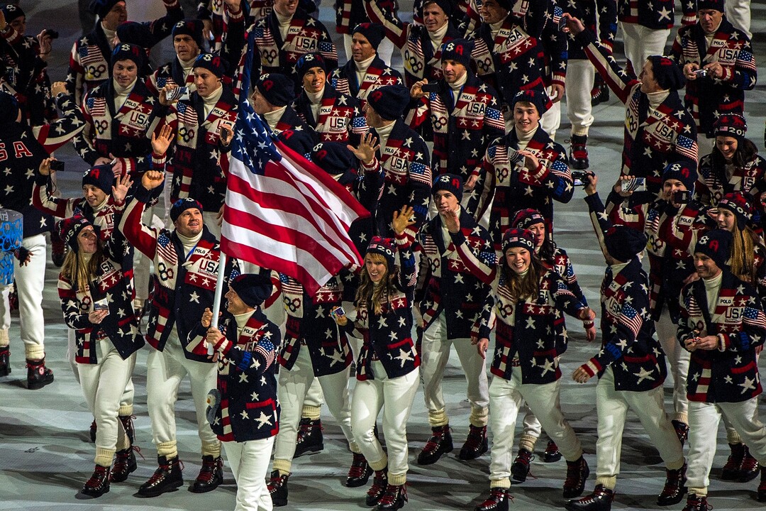 SOCHI, RUSSIA  - JANUARY 7:Bobsled athlete Steven Holcomb, left behind flag bearer Todd Lodwick, and team USA are introduced during the Opening Ceremony of the 2014 Sochi Olympics at Fisht Olympic Stadium Friday February 7, 2014.(Photo by Chris Detrick/The Salt Lake Tribune)