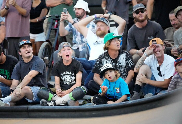 (Francisco Kjolseth | The Salt Lake Tribune) Young fans are delighted by the big air tricks as part of Tony Hawk’s Vert Alert “Legends Demo” with old-school vert skateboards such as Christian Hosoi, Mike McGill, Bucky Lasek and Lizzie Armanto at the Utah State Fairpark on Friday, Aug. 26, 2022. 