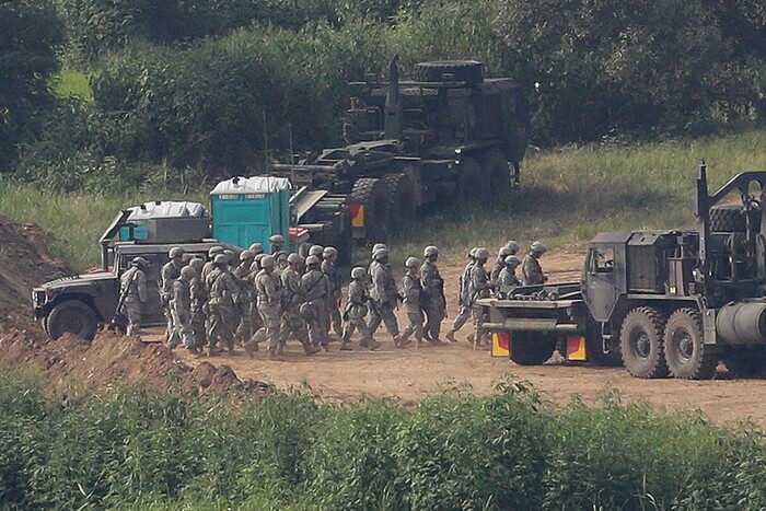 FILE - In this Aug. 24, 2016, file photo, U.S. Army soldiers move during the annual U.S. South Korea Ulchi-Freedom Guardian military exercises in Paju, South Korea, near the border with North Korea. America’s annual joint military exercises with South Korea always frustrate North Korea. The war games set to begin Monday, Aug. 21, 2017 may hold more potential to provoke than ever, given U.S. President Donald Trump’s “fire and fury” threats and Pyongyang’s as-yet-unpursued plan to launch missiles close to Guam. (AP Photo/Ahn Young-joon, File)
