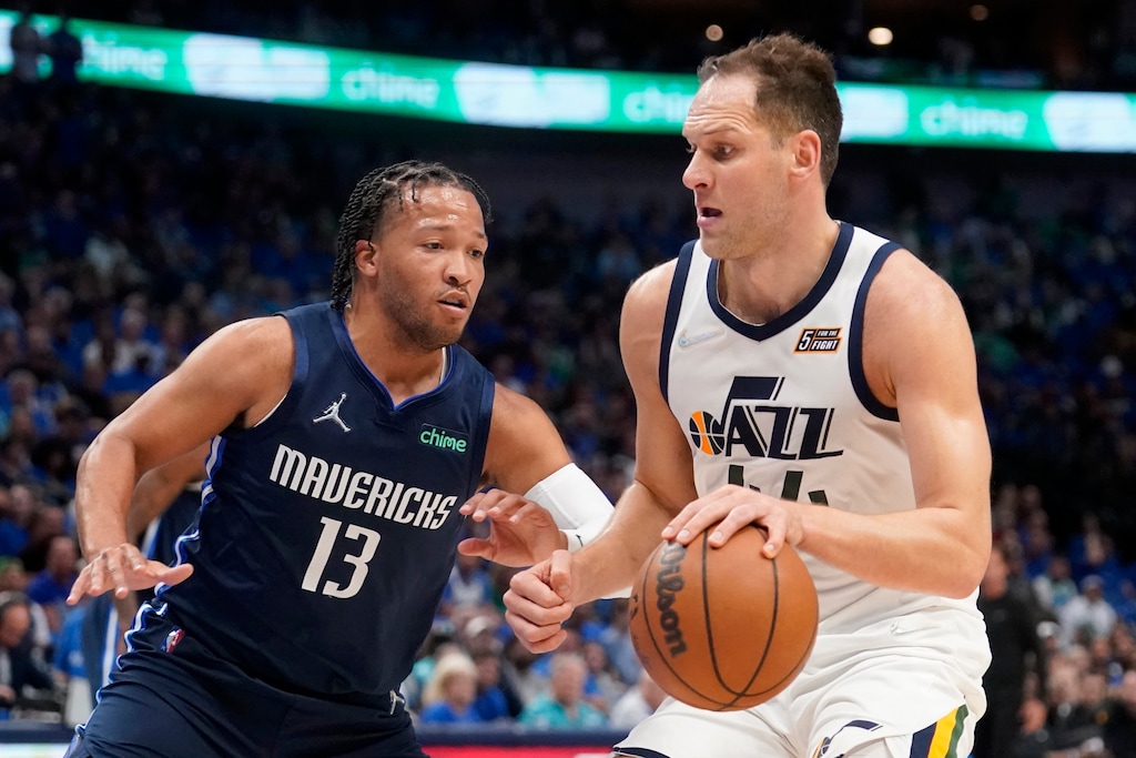 (Tony Gutierrez | AP) Dallas Mavericks guard Jalen Brunson (13) defends as Utah Jazz forward Bojan Bogdanovic (44) works to the basket in the first half of Game 1 of an NBA basketball first-round playoff series, Saturday, April 16, 2022, in Dallas.