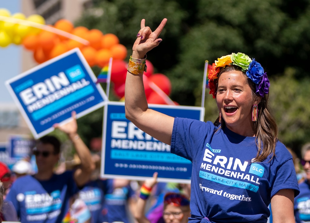 (Rick Egan | The Salt Lake Tribune)  Salt Lake City Mayor Erin Mendenhall rides her bike, in the Pride Parade, on Sunday, June 4, 2023.