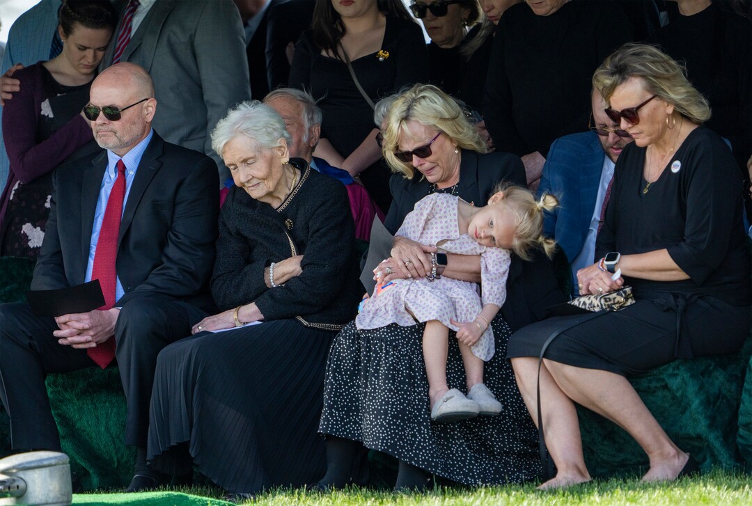 (Rick Egan | The Salt Lake Tribune)  The family bow their heads for the dedication of the grave, during graveside services for Orrin Hatch, at the Newton Cemetery, on Friday, May 6, 2022.