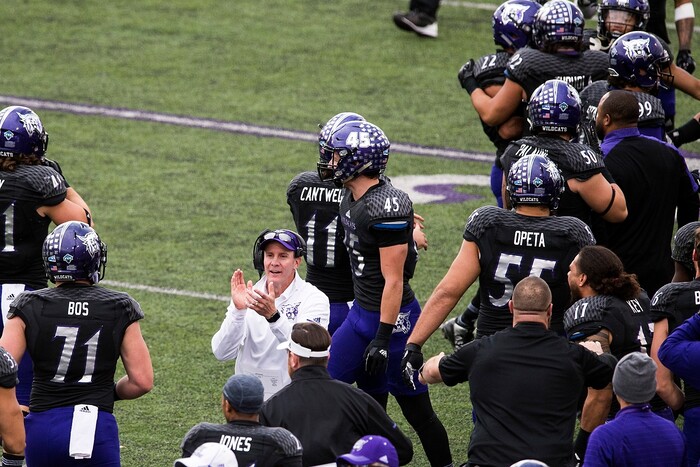 (Chris Detrick  |  The Salt Lake Tribune)  Weber State Wildcats head coach Jay Hill cheers during the game at Stewart Stadium Saturday, November 25, 2017.  