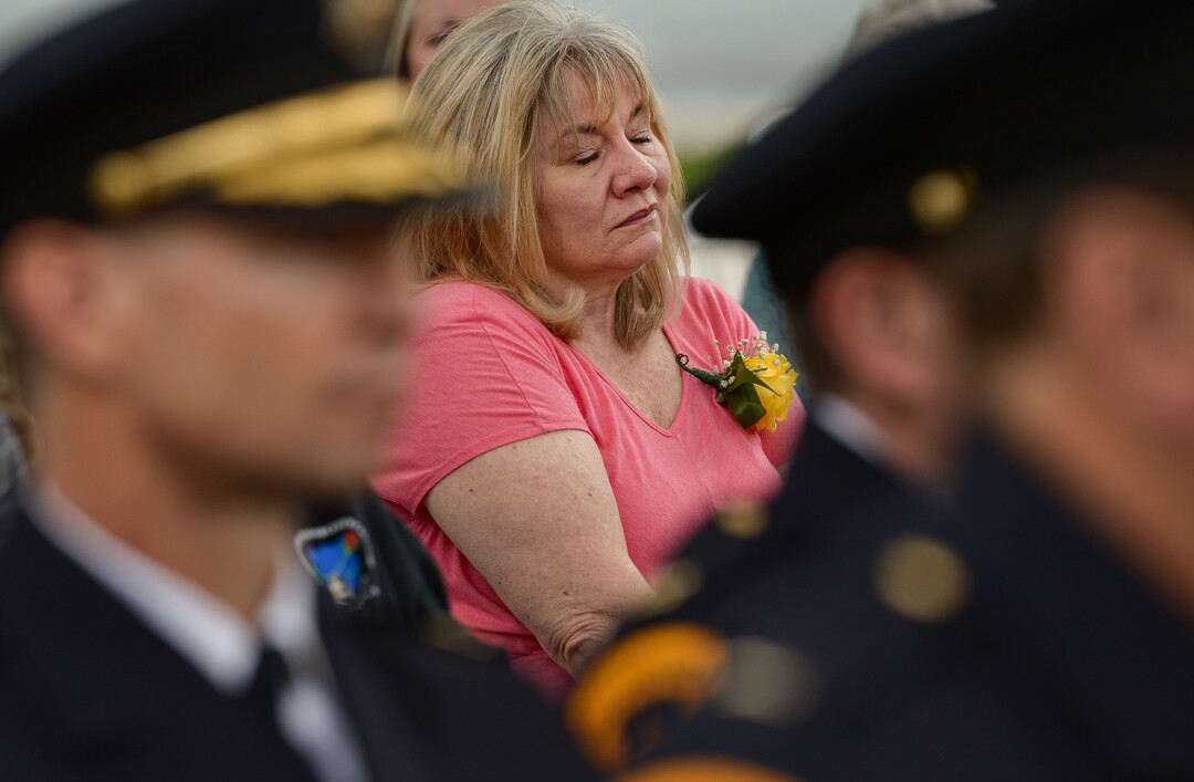 (Leah Hogsten  |  The Salt Lake Tribune)  Julie Cawley Hanson becomes emotional after placing a carnation in memory of her brother Detective James W. Cawley, who died in the line of duty in 2003. In honor of Police Week, the Salt Lake City Police Department honored its fallen officers with a memorial service and a 21-gun salute at the Public Safety Building, Thursday, May16, 2019.