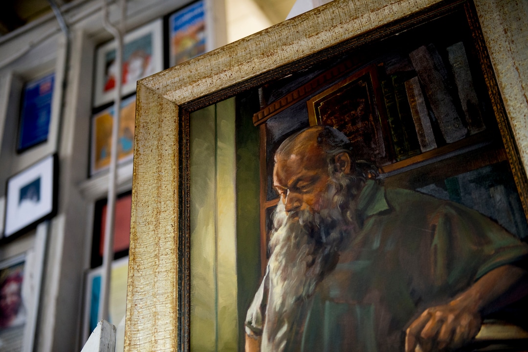 (Jeremy Harmon  |  The Salt Lake Tribune) A painting of Ken Sanders hangs on the wall in his book store in Salt Lake City on January 16, 2020.