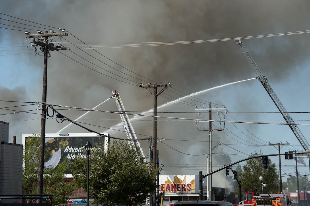 (Francisco Kjolseth  |  The Salt Lake Tribune) Crews work to extinguish a fire at 800 South 200 West in Salt Lake City on Wednesday, Sept. 9, 2020.