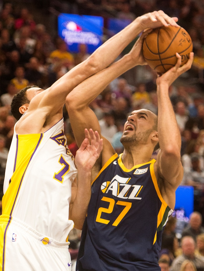 (Rick Egan  |  The Salt Lake Tribune)  Utah Jazz center Rudy Gobert (27) is fouled by Los Angeles Lakers forward Larry Nance Jr. (7), in NBA action, Utah Jazz vs. Los Angeles Lakers, in Salt Lake City, Saturday, October 28, 2017.