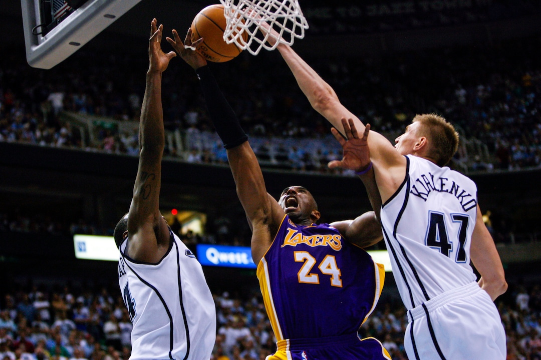 (Trent Nelson  |  The Salt Lake Tribune) Los Angeles Lakers guard Kobe Bryant  (24) drives on Utah Jazz forward Paul Millsap (24) and Utah Jazz forward Andrei Kirilenko (47). Utah Jazz vs. Los Angeles Lakers, game six, NBA playoffs second round, Friday, May 16, 2008.
