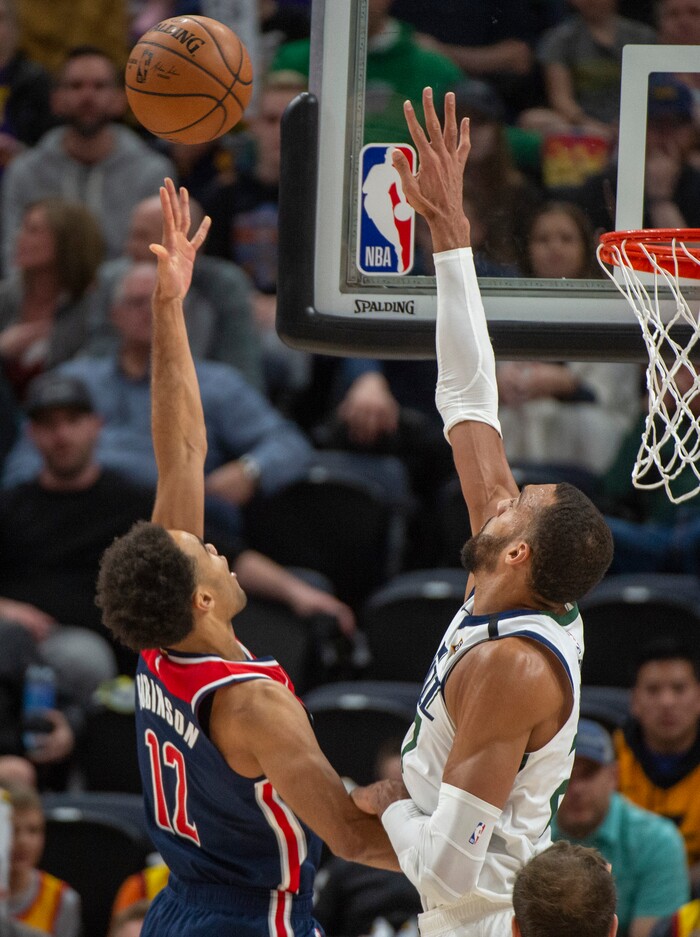 (Rick Egan  |  The Salt Lake Tribune)  Washington Wizards guard Jerome Robinson (12) shoots over Utah Jazz center Rudy Gobert (27), in NBA action between the Utah Jazz and the Washington Wizards, in Salt Lake City, Friday, February 28, 2020
