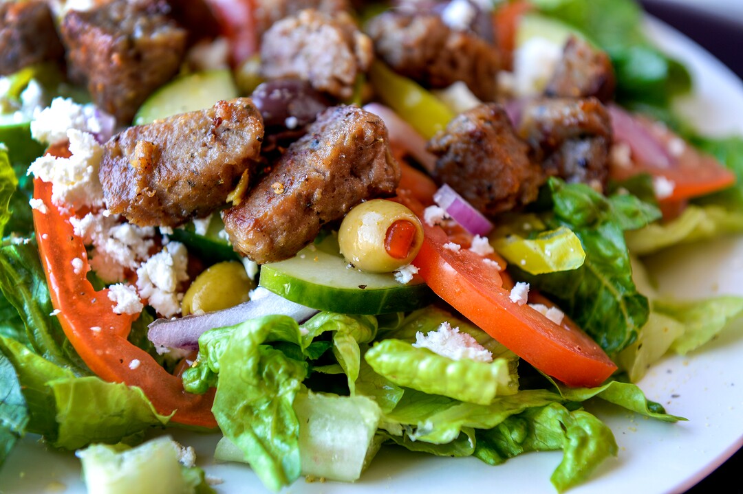 (Leah Hogsten  |  The Salt Lake Tribune) Salad served with lamb tomatoes, onions, cucumbers, olives and feta cheese at Pasha Middle Eastern Cuisine. Pasha Middle Eastern Cuisine specializes in a fusion of Moroccan, Mediteranean and Middle Eastern dishes, Aug. 14, 2019.