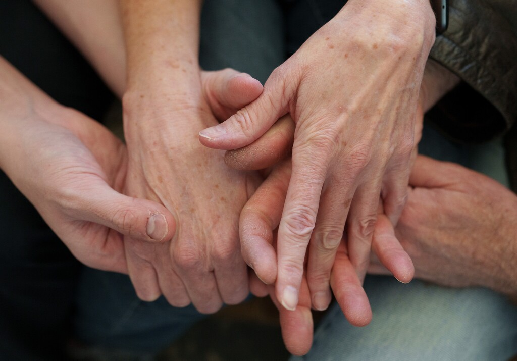 (Leah Hogsten | The Salt Lake Tribune)  New University of Utah research suggests if Utah wants to improve the wellbeing of women, making them feel safer will be key. Here, multiple generations grasp hands in connection, on Feb. 12, 2022.
