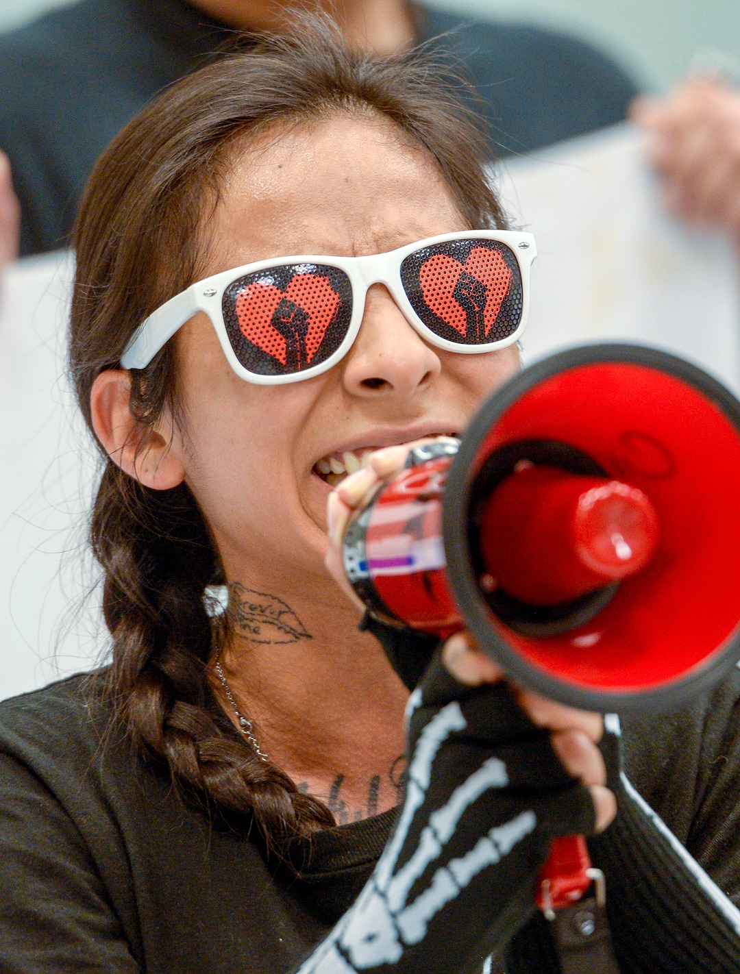 Leah Hogsten  |  The Salt Lake Tribune   A woman with Civil Riot speaks to those attending the meeting. A group called Civil Riot shut down the Inland Port Authority Board meeting at North Star Elementary’s gymnasium Wednesday, April 24, 2019 shortly after it began by speaking over board chairman Derek Miller.