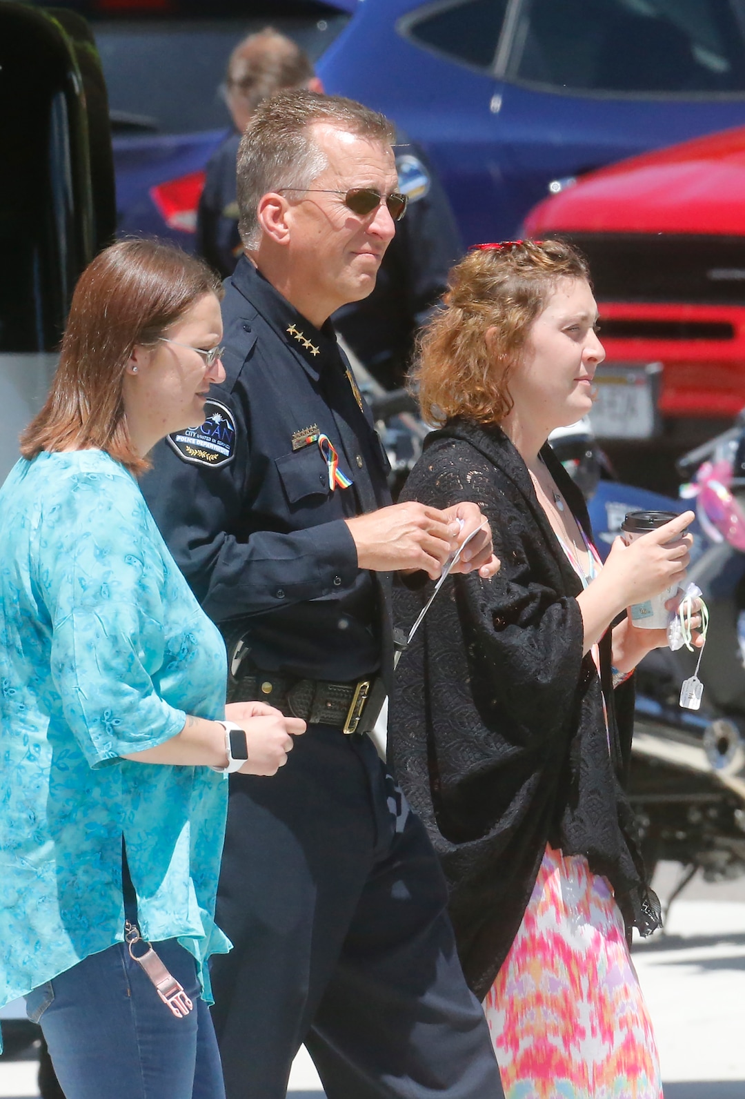 Jessica Whipple, right, walks with Logan Police Chief Gary Jensen, center, before the services at Nyman Funeral Home Tuesday, June 4, 2019, in Logan, Utah, for her daughter Elizabeth "Lizzy" Shelley, a 5-year-old girl who police say was taken from her home and killed by her uncle.  Her uncle, Alex Whipple, is charged with killing her after his sister let him spend the night at the family's home, prosecutors said. Elizabeth "Lizzy" Shelley disappeared May 25 and was found dead less than a block from her home after a five-day search. (AP Photo/Rick Bowmer)