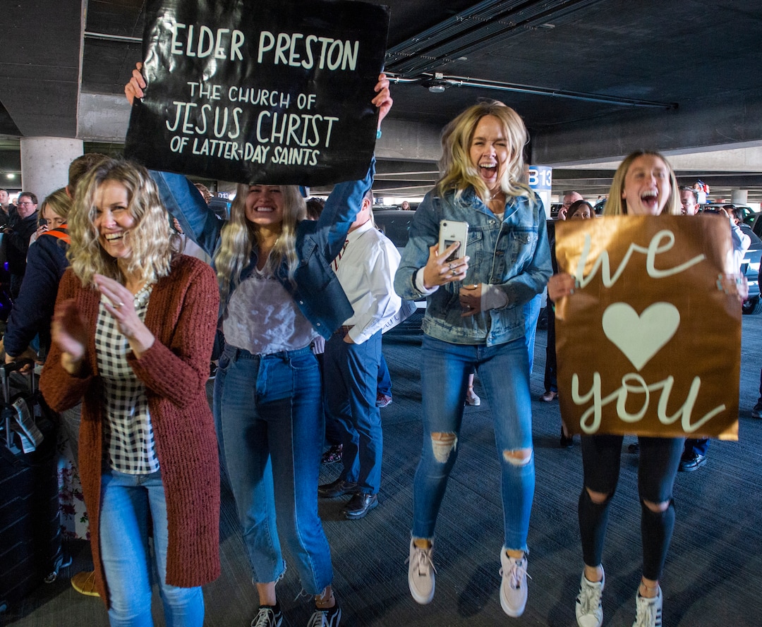 (Rick Egan  |  The Salt Lake Tribune)     Members of the Preston family form Kaysville cheer for Elder Kaleb Preston as he returns from his mission in the Philippines, at Salt Lake City International Airport, Sunday, March 22, 2020.