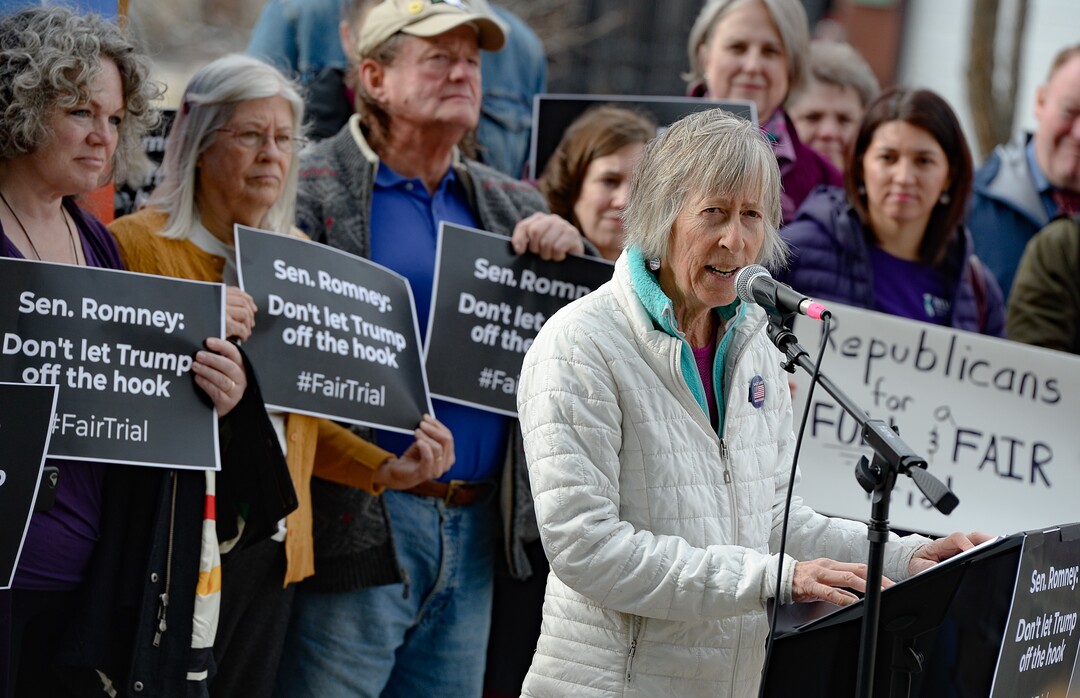 (Francisco Kjolseth  |  The Salt Lake Tribune) Joanne Slotnik, co-founder of Salt Lake Indivisible, joins a coalition of Republicans, Democrats and independents asking for a fair impeachment trial in the Senate as they gather for a news conference in front of Sen. Mitt Romney's office at the Wallace F. Bennett Federal building in Salt Lake City on Thursday, Jan. 16, 2020.