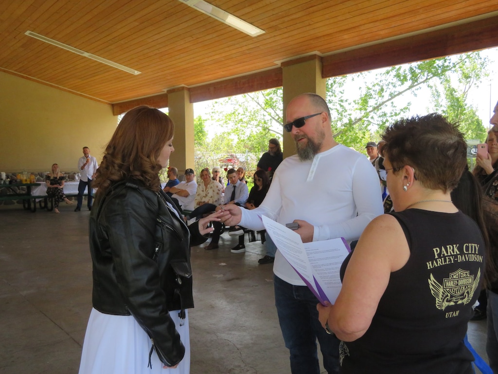 (Courtesy photo | The Schneedles) Brian Schiele and Denise Needles were married by friend Kathey McMaster, Saturday, May 4, at Winchester Park in Murray. The couple, who for fun go by the hybrid name " the Schneedles," are surrounded by family and friends, some of whom joined them in a 110-mile motorcycle ride after the ceremony. McMaster, a minister of the Universal Life Church, said she obtained her officiant credentials to accommodate member of her motorcycle riding group, Our Lady of the Blessed V-Twin. "What an honor it was to be able to marry two very dear friends that mean the world to me and to each other," McMaster told The Tribune.
