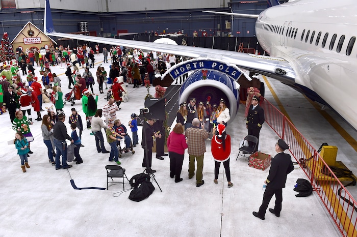 (Scott Sommerdorf   |  The Salt Lake Tribune)   Patients from Primary Children’s and Shriners Hospitals were treated to a unique experience on Saturday at a Delta hangar of the Slat Lake International airport. They boarded a Boeing 737 which taxied to their final destination—Santa’s Winter Wonderland, Saturday, December 2, 2017.  